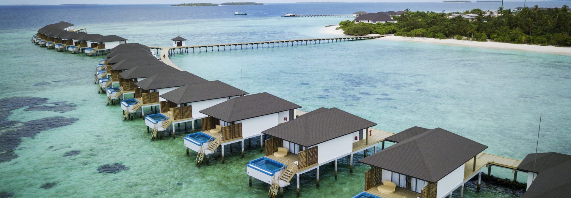 Luftaufnahme Wasserbungalows Malediven Robinson Club